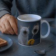 Laughing Cat: Spoon Reflection — Ceramic Mug — adult lifestyle view